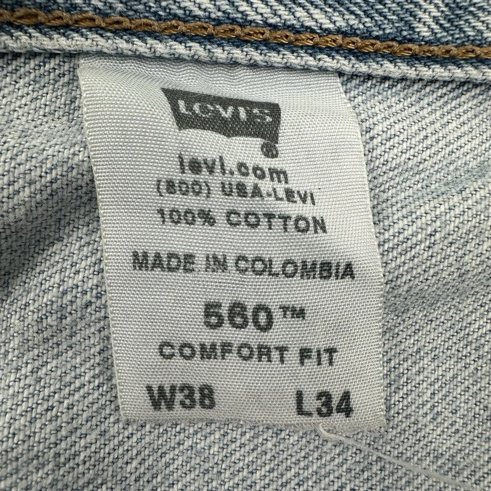 VTG‎ Levi's 560 Comfort Fit 38x34 Tapered Loose Jeans Light Wash Distressed Y2K